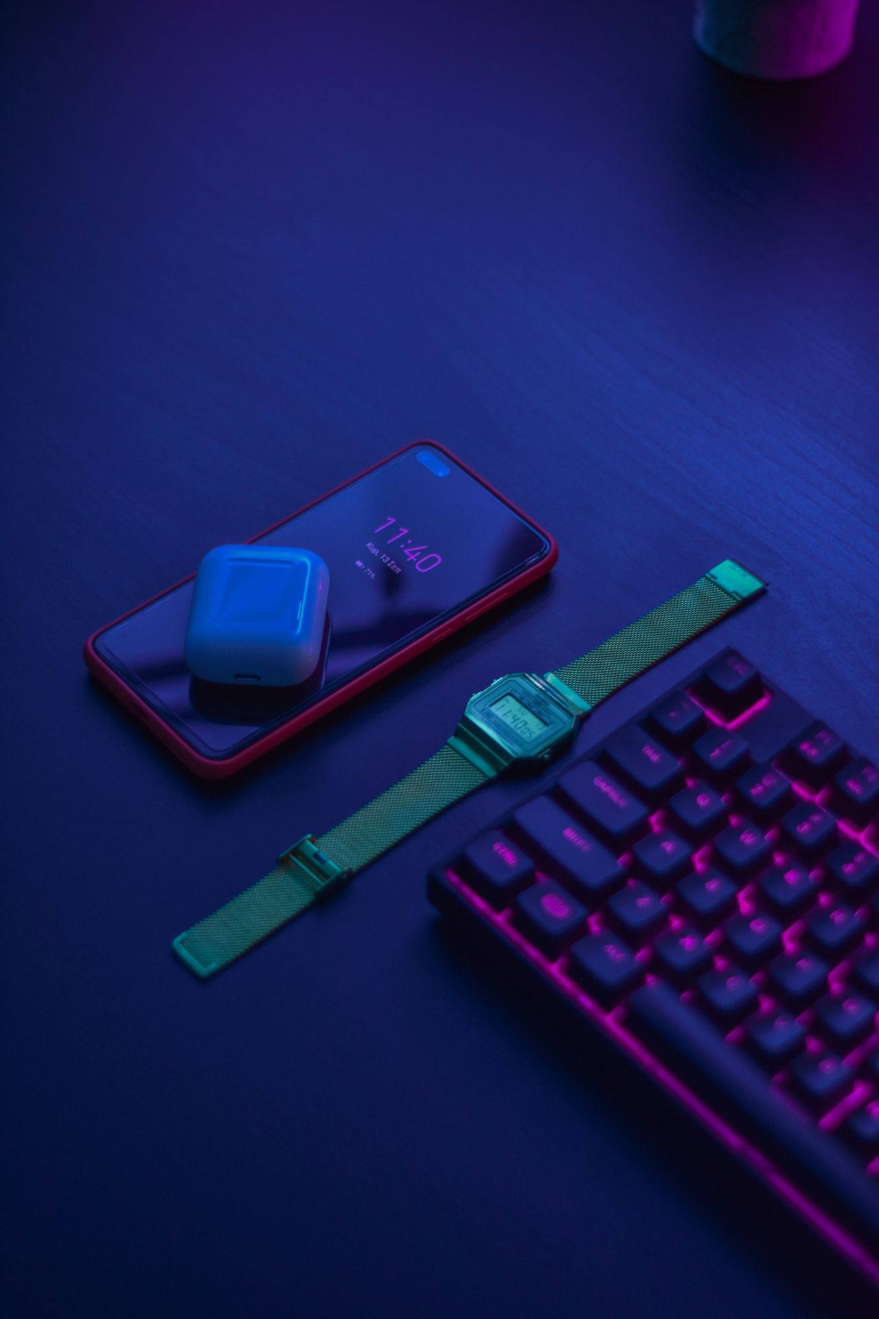 blue apple watch with green strap